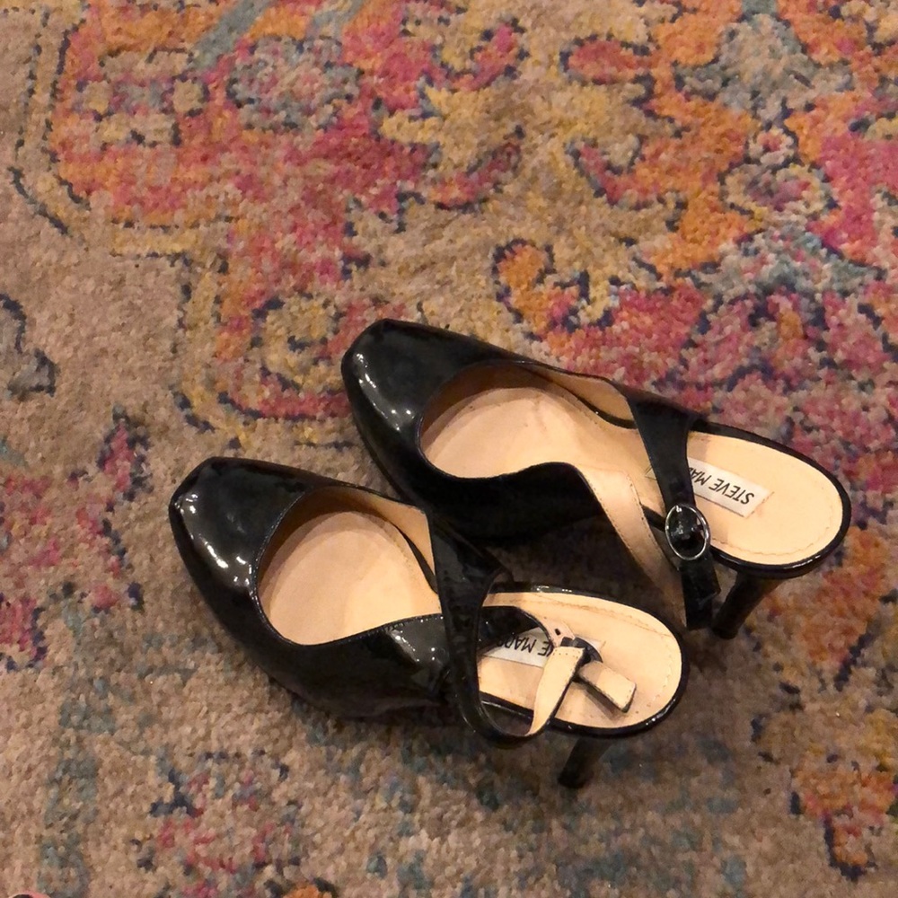 Black patent leather sling back heel.